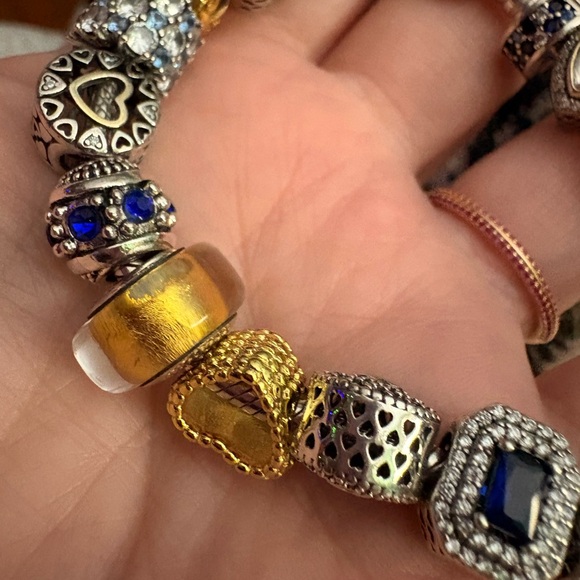 Pandora bracelet with silver, gold, blue charms - Picture 3 of 6